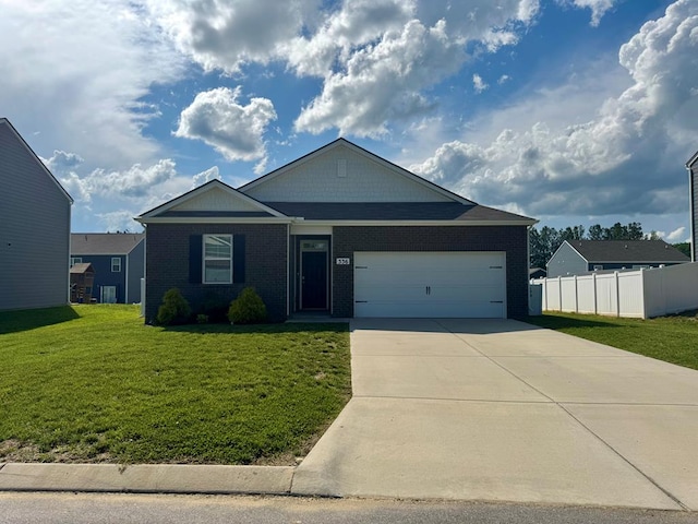 336 Oliver Way, Baxter, TN 38544 - ranch-style home with driveway, an attached garage, and brick siding