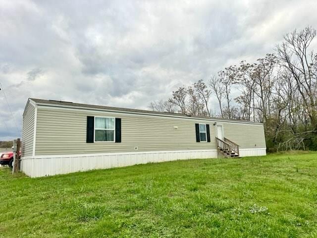00 Loyalty Ln, Sparta, TN 38583 - rear view of house with entry steps and a yard
