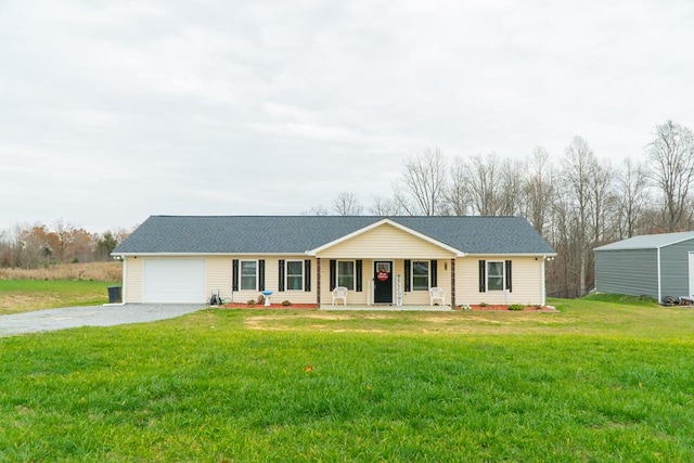 ranch-style house with an attached garage, driveway, a porch, and a front yard