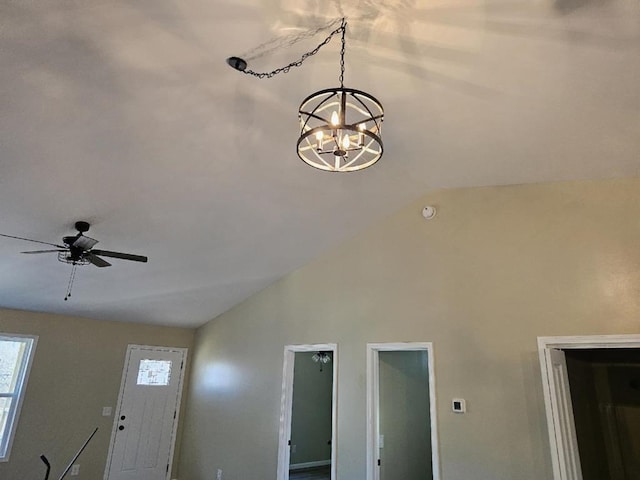 entryway featuring vaulted ceiling and ceiling fan