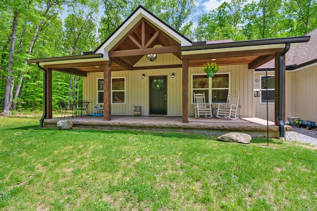 98 Paso Fino Trl, Jamestown, TN 38556 - rear view of house featuring a yard and a porch