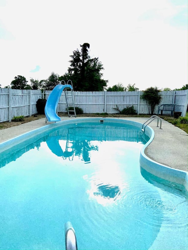 1039 Old Martha Washington Rd, Clarkrange, TN 38553 - view of pool featuring a water slide and a fenced backyard