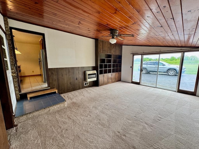 1039 Old Martha Washington Rd, Clarkrange, TN 38553 - unfurnished living room with wood ceiling, heating unit, wood walls, carpet floors, and a ceiling fan