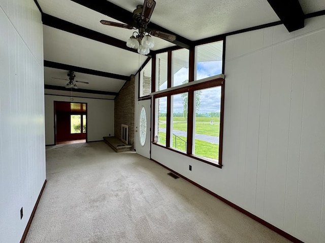 1039 Old Martha Washington Rd, Clarkrange, TN 38553 - unfurnished living room with a ceiling fan, a brick fireplace, and carpet