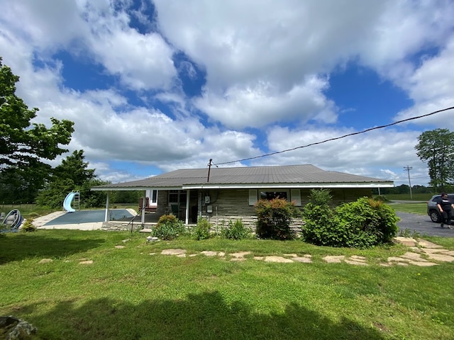 1039 Old Martha Washington Rd, Clarkrange, TN 38553 - back of house with a lawn and stone siding