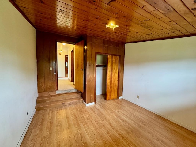 1039 Old Martha Washington Rd, Clarkrange, TN 38553 - spare room featuring wooden ceiling, light wood finished floors, and wooden walls