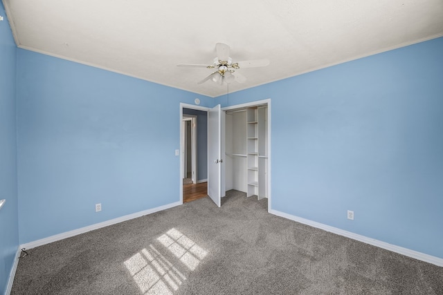 unfurnished bedroom featuring a ceiling fan, carpet, baseboards, and a closet