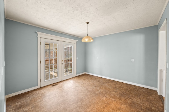 spare room featuring visible vents, a textured ceiling, french doors, crown molding, and baseboards