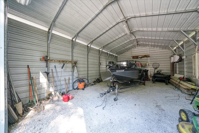 garage featuring a detached carport