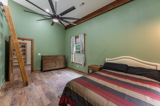 294 Big Piney Loop, Wilder, TN 38589 - bedroom featuring wood finished floors, high vaulted ceiling, baseboards, and a ceiling fan
