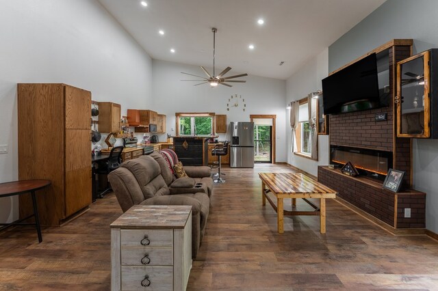 294 Big Piney Loop, Wilder, TN 38589 - living room featuring high vaulted ceiling, recessed lighting, a fireplace, a ceiling fan, and dark wood finished floors