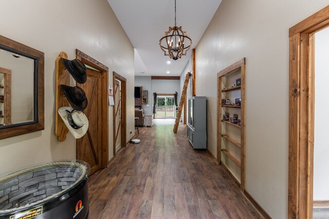 294 Big Piney Loop, Wilder, TN 38589 - hallway with dark wood finished floors and a chandelier