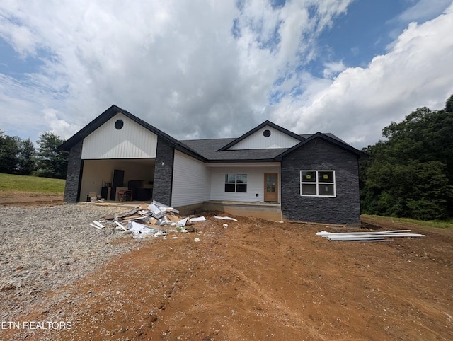 249 Old Grimsley Ct, Grimsley, TN 38565 - view of front of property featuring an attached garage and stone siding