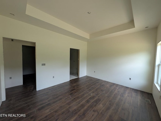 249 Old Grimsley Ct, Grimsley, TN 38565 - empty room with a raised ceiling and wood finished floors