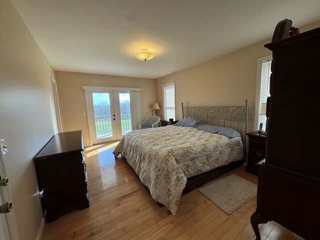 1032 Kendall Smith Rd, Pikeville, TN 37367 - bedroom with access to exterior and light wood finished floors