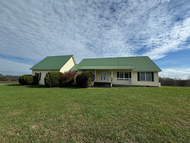 1032 Kendall Smith Rd, Pikeville, TN 37367 - view of front of house featuring a porch, a metal roof, and a front yard