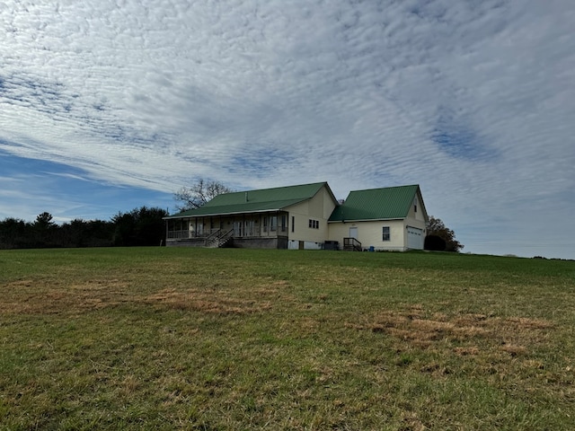 1032 Kendall Smith Rd, Pikeville, TN 37367 - view of front of property with a front lawn, a garage, and covered porch