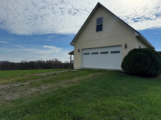 1032 Kendall Smith Rd, Pikeville, TN 37367 - view of property exterior featuring a garage, a yard, and driveway