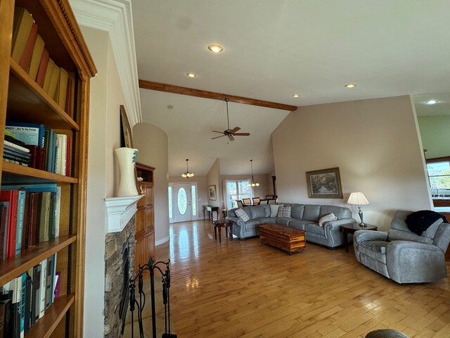 1032 Kendall Smith Rd, Pikeville, TN 37367 - living room featuring a stone fireplace, plenty of natural light, light wood-style floors, a chandelier, and recessed lighting