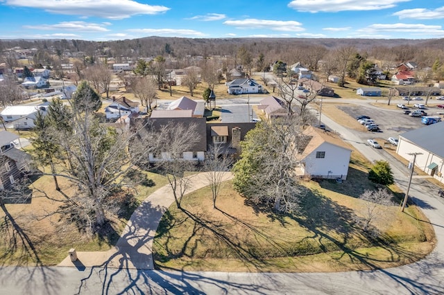 birds eye view of property with a residential view