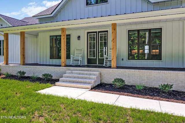 320 Ridge Ln, Monterey, TN 38574 - entrance to property with board and batten siding, a porch, and roof with shingles