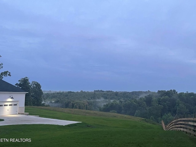 320 Ridge Ln, Monterey, TN 38574 - view of green lawn with concrete driveway and a garage