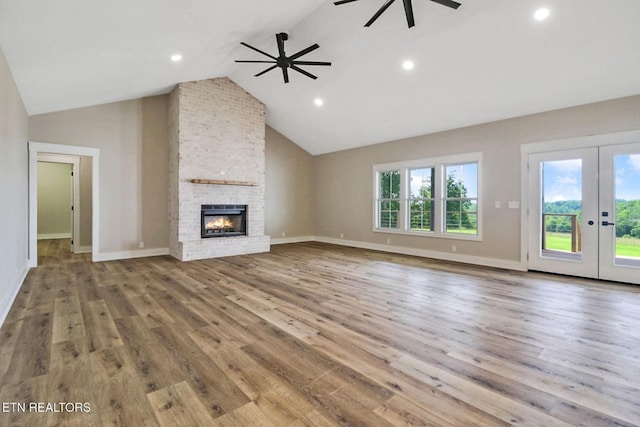320 Ridge Ln, Monterey, TN 38574 - unfurnished living room with ceiling fan, wood finished floors, french doors, recessed lighting, and a fireplace