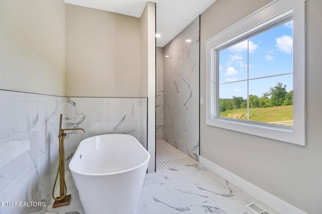 320 Ridge Ln, Monterey, TN 38574 - full bath featuring a marble finish shower, marble tiled floors, a freestanding tub, tile walls, and recessed lighting