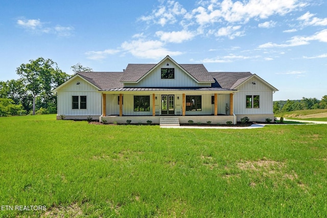 320 Ridge Ln, Monterey, TN 38574 - modern inspired farmhouse with board and batten siding, roof with shingles, covered porch, and a front lawn