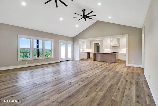 320 Ridge Ln, Monterey, TN 38574 - unfurnished living room featuring a ceiling fan, high vaulted ceiling, recessed lighting, light wood-style flooring, and french doors