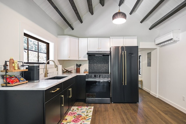 122 Abby Ln, Byrdstown, TN 38549 - kitchen with freestanding refrigerator, electric range oven, a wall unit AC, white cabinets, and light stone counters