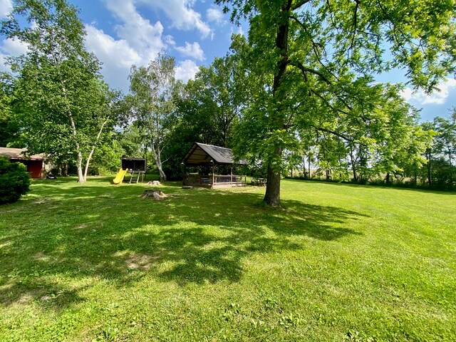 151 Dykes Ln, Crossville, TN 38571 - view of grassy yard featuring a gazebo and a playground