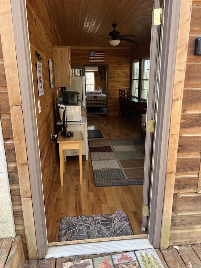 doorway to property with a ceiling fan