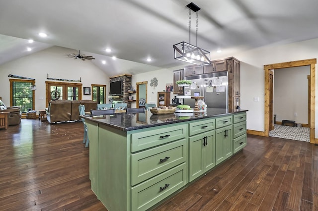2810 Stockton Rd, Jamestown, TN 38556 - kitchen with green cabinets, high end refrigerator, dark wood-style floors, vaulted ceiling, and open floor plan