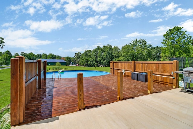2810 Stockton Rd, Jamestown, TN 38556 - swimming pool with a wooden deck, a yard, and grilling area