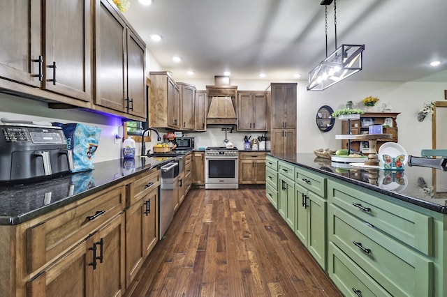 2810 Stockton Rd, Jamestown, TN 38556 - kitchen with stainless steel appliances, dark wood finished floors, premium range hood, recessed lighting, and pendant lighting