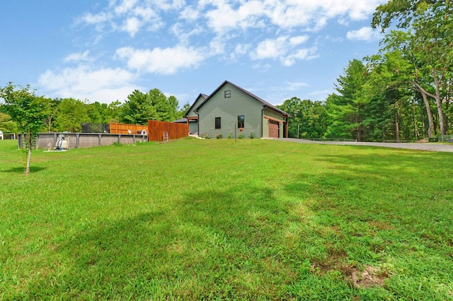 2810 Stockton Rd, Jamestown, TN 38556 - view of yard with driveway and an attached garage