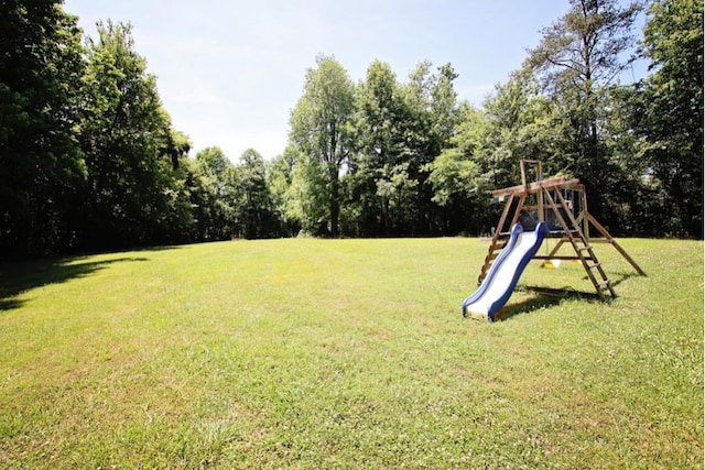 view of yard featuring playground community