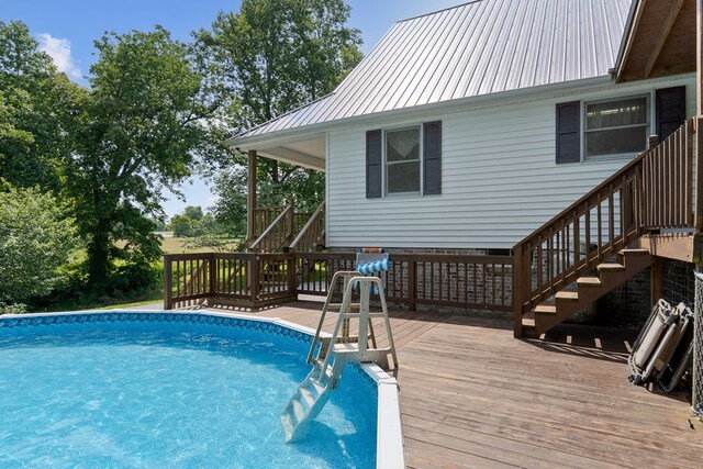 2876 Hilham Hwy, Hilham, TN 38568 - outdoor pool featuring stairs and a wooden deck