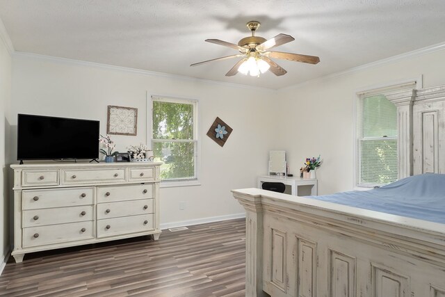 2876 Hilham Hwy, Hilham, TN 38568 - bedroom with dark wood-type flooring, ornamental molding, and ceiling fan