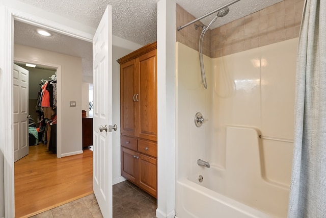 2876 Hilham Hwy, Hilham, TN 38568 - full bathroom with a textured ceiling and shower / tub combo with curtain