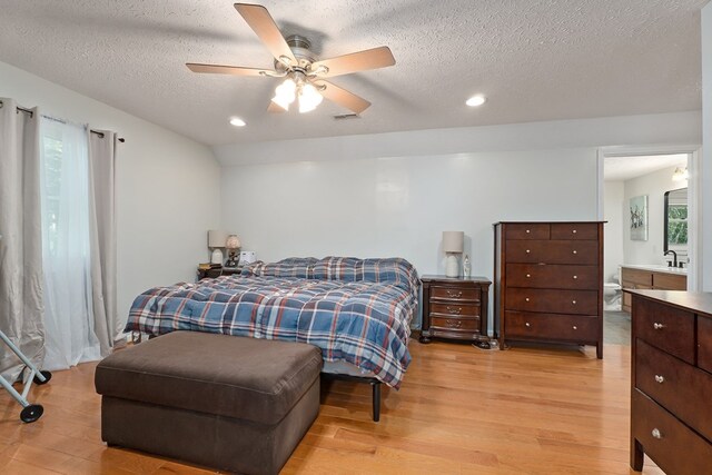 2876 Hilham Hwy, Hilham, TN 38568 - bedroom with light wood finished floors, a textured ceiling, recessed lighting, and ceiling fan