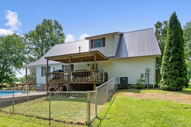 2876 Hilham Hwy, Hilham, TN 38568 - back of house featuring a fenced backyard, a metal roof, and a deck