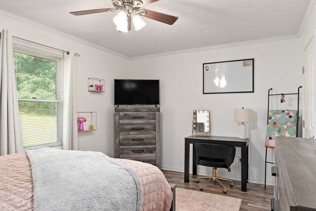 2876 Hilham Hwy, Hilham, TN 38568 - bedroom with wood finished floors, crown molding, and a ceiling fan
