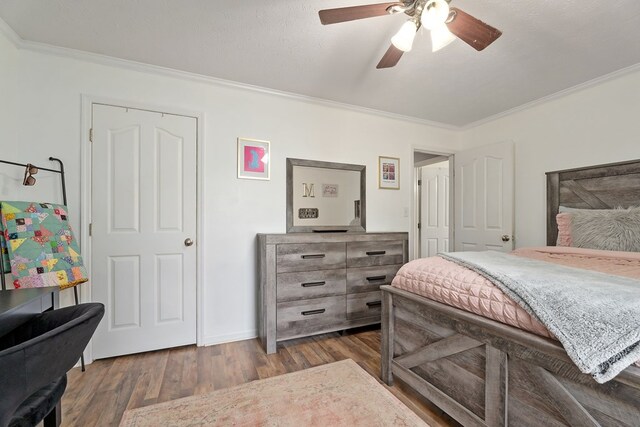 2876 Hilham Hwy, Hilham, TN 38568 - bedroom featuring crown molding, wood finished floors, and ceiling fan