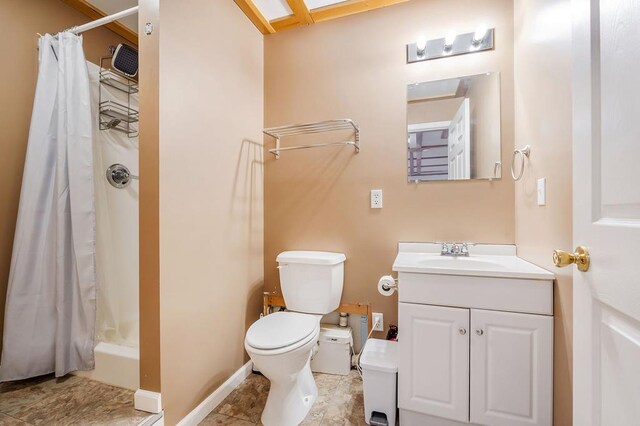 bathroom with toilet, a shower with curtain, tile patterned flooring, and vanity