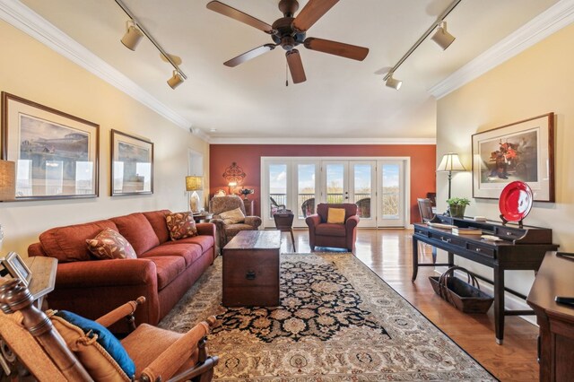7100 Dale Ridge Rd, Lancaster, TN 38569 - living area with rail lighting, a ceiling fan, ornamental molding, wood finished floors, and french doors