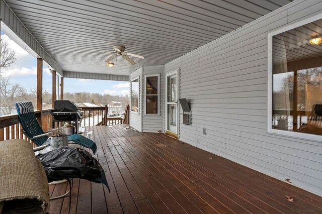 snow covered deck with a ceiling fan