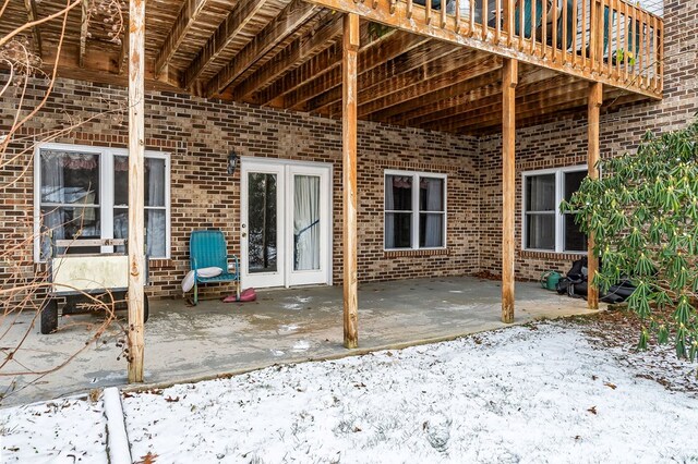 view of snow covered patio