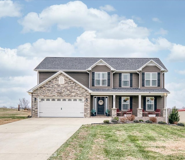 craftsman-style house featuring a porch, stone siding, driveway, and a front lawn